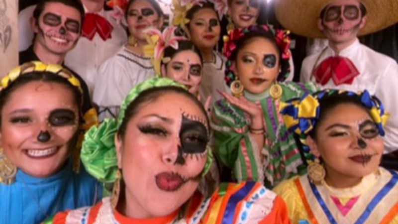 A selfie of a group of Ballet Folklorico club members in costume.