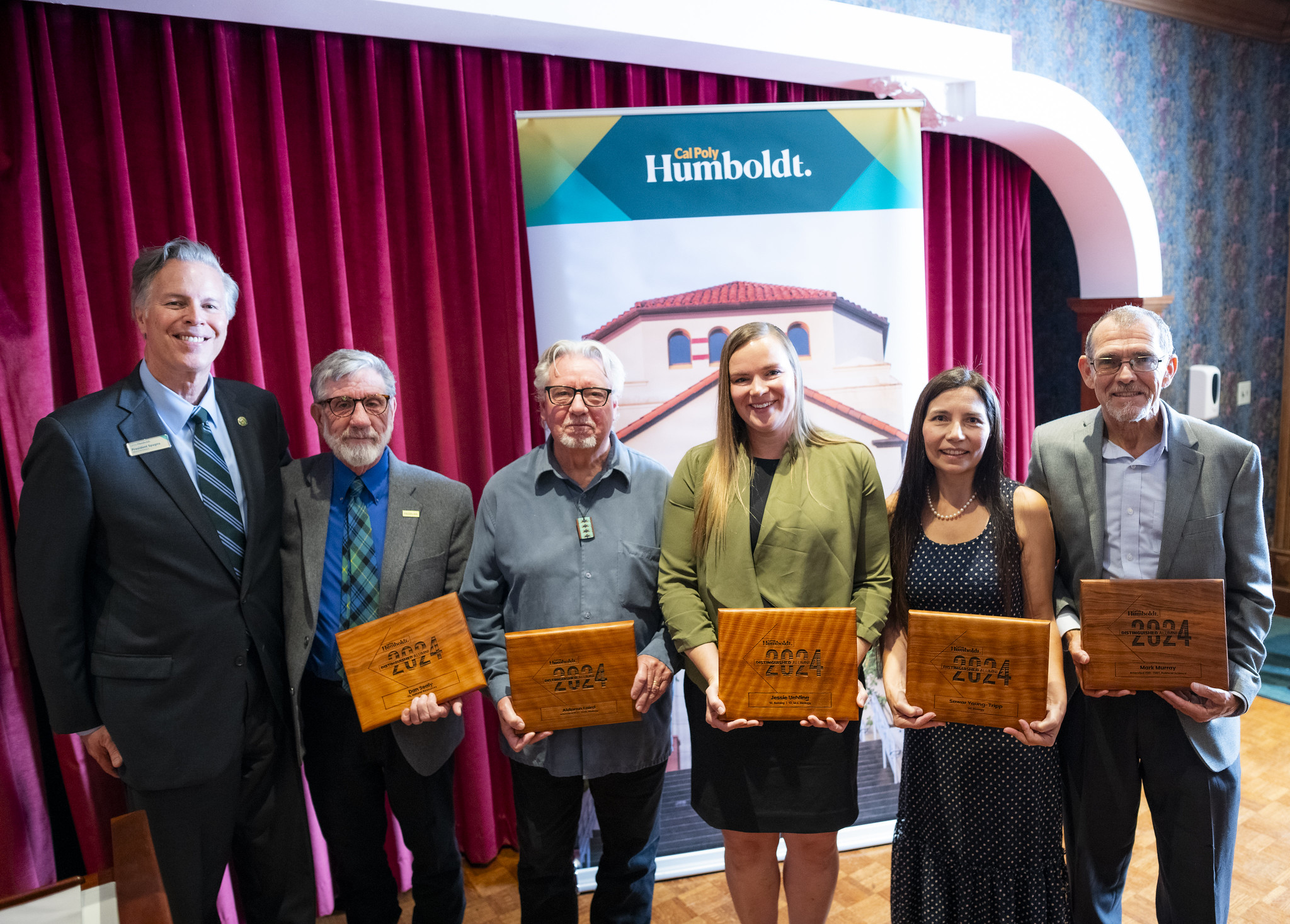 2024 Distinguished Alumni Winners with President Michael Spagna