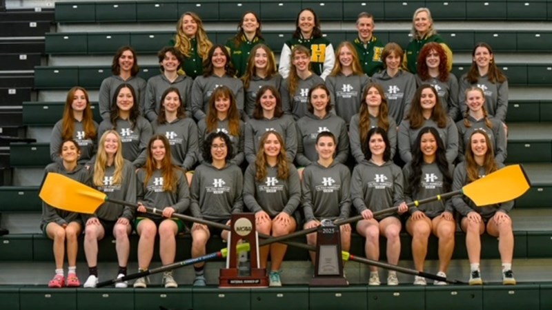 Team photo of Humboldt women's rowing in their uniforms.
