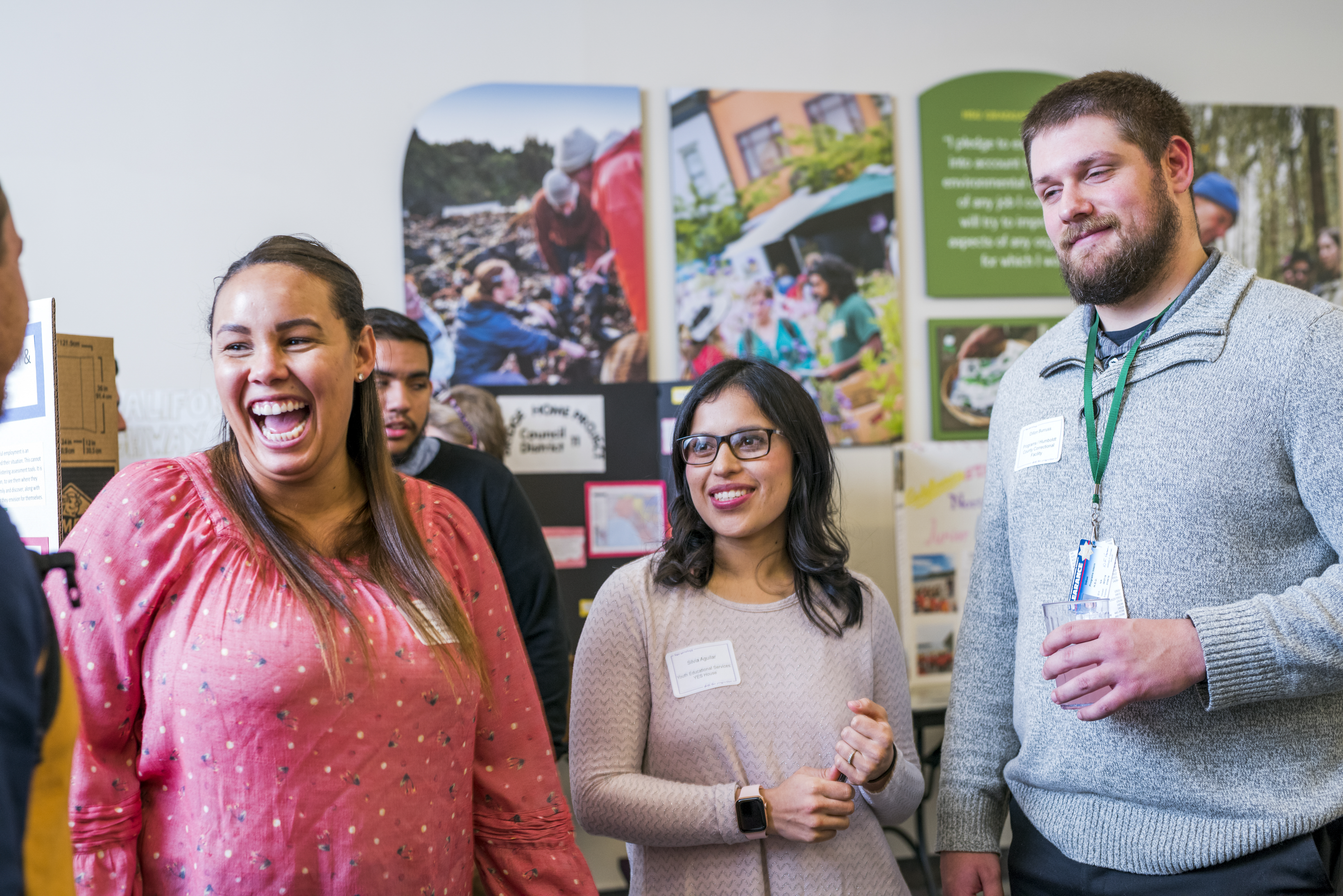 Three sociology students smiling.