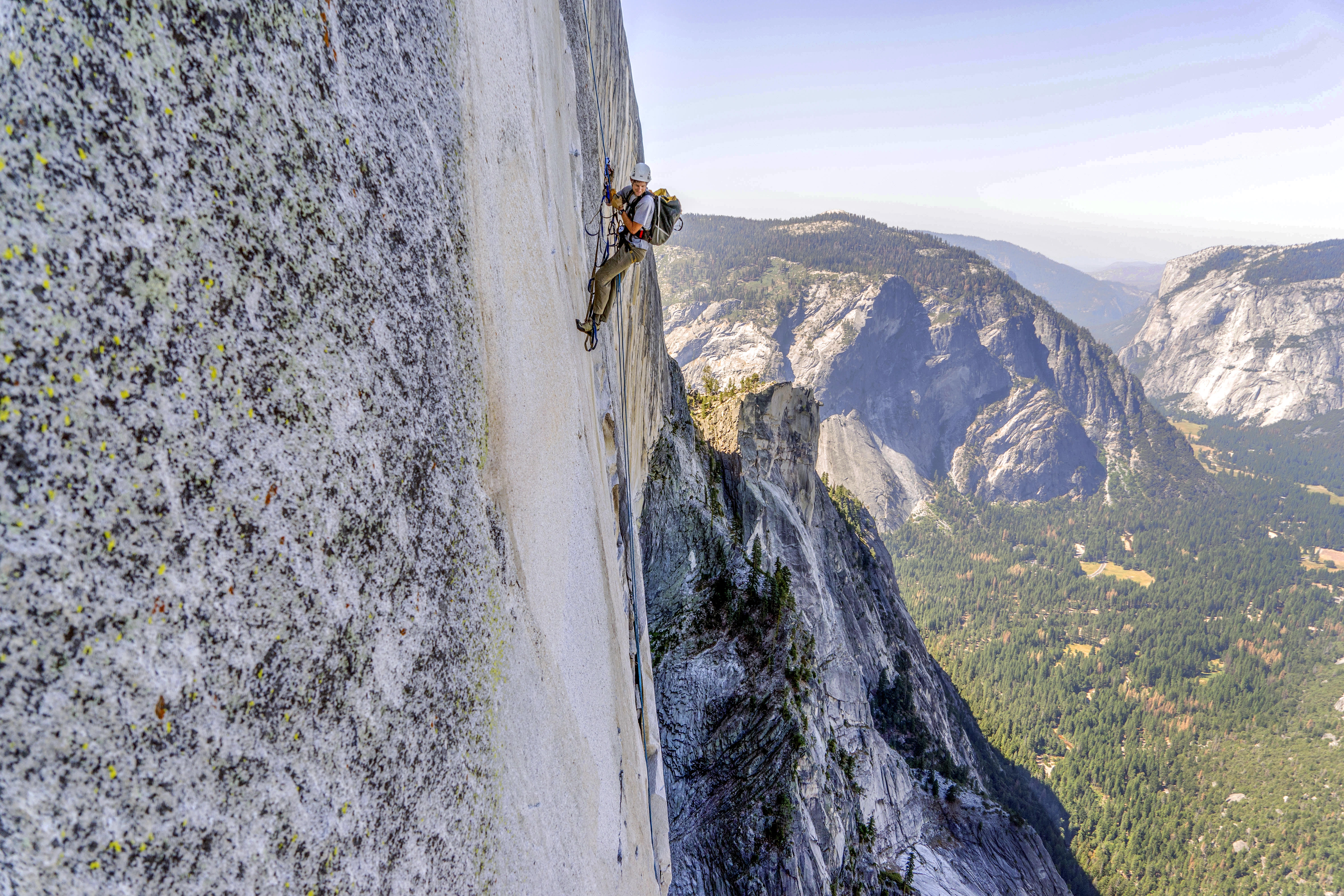 Stock ascends Half Dome in Yosemite National Park. As the official geologist of Yosemite National Park, Stock uses his rock climbing skills to assess rock formations for the safety of the park’s four million annual visitors.  