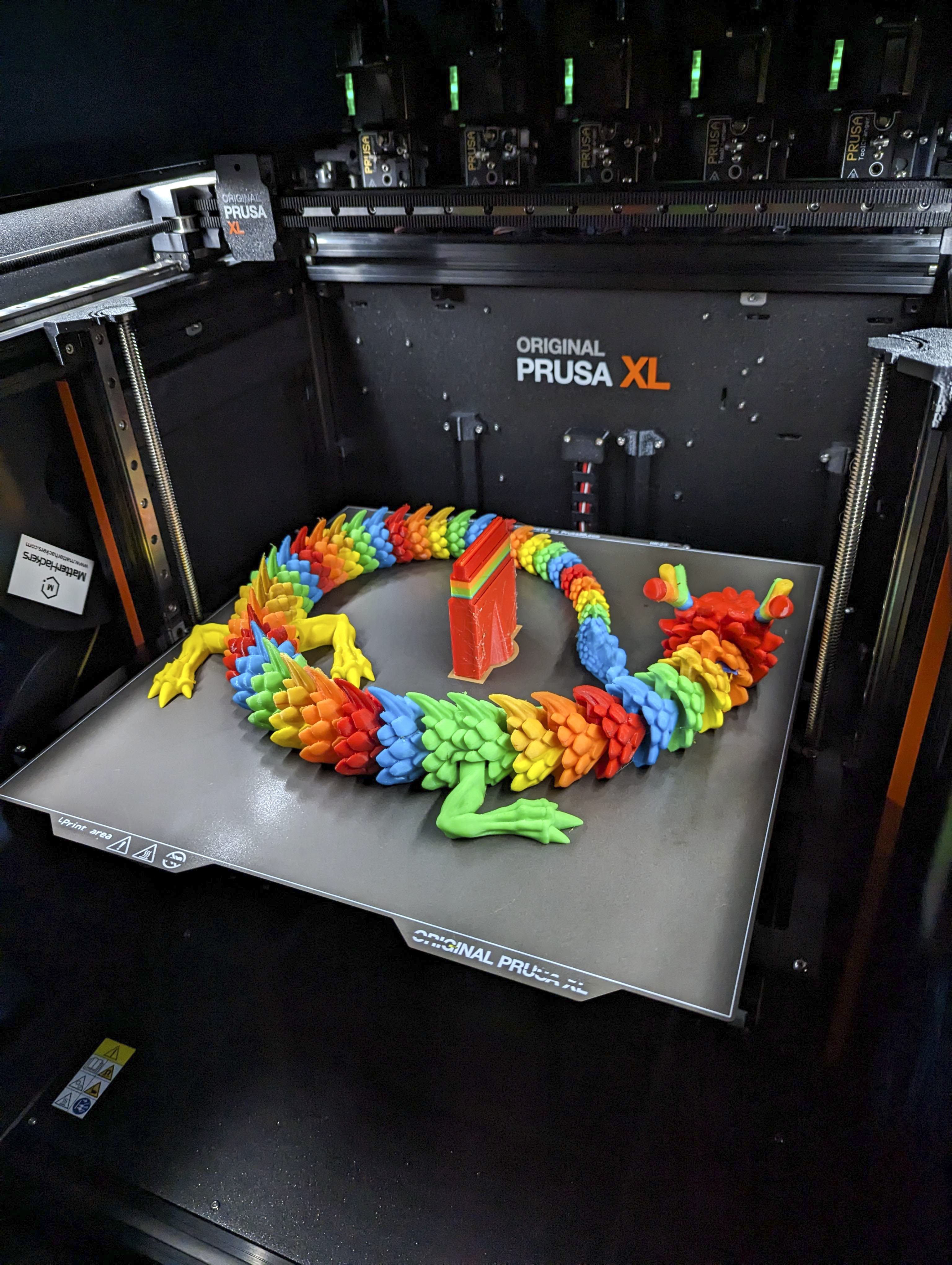 A 3D printed rainbow dragon. 