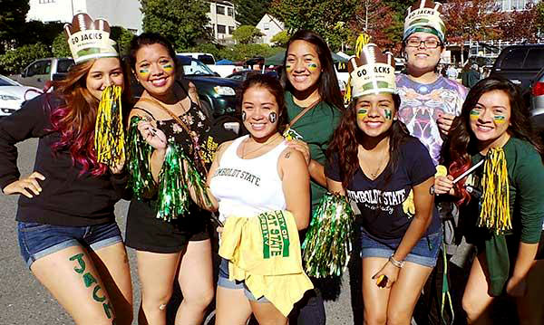 HSU students celebrate at a tailgate party.