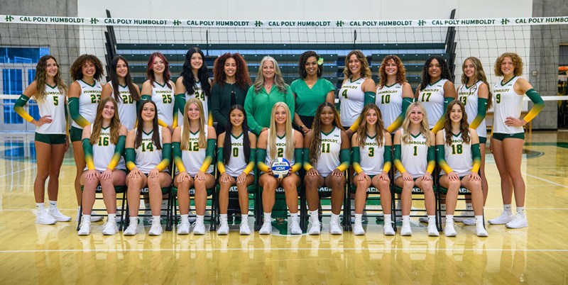 Team photo of the Humboldt women's volleyball team on the court.